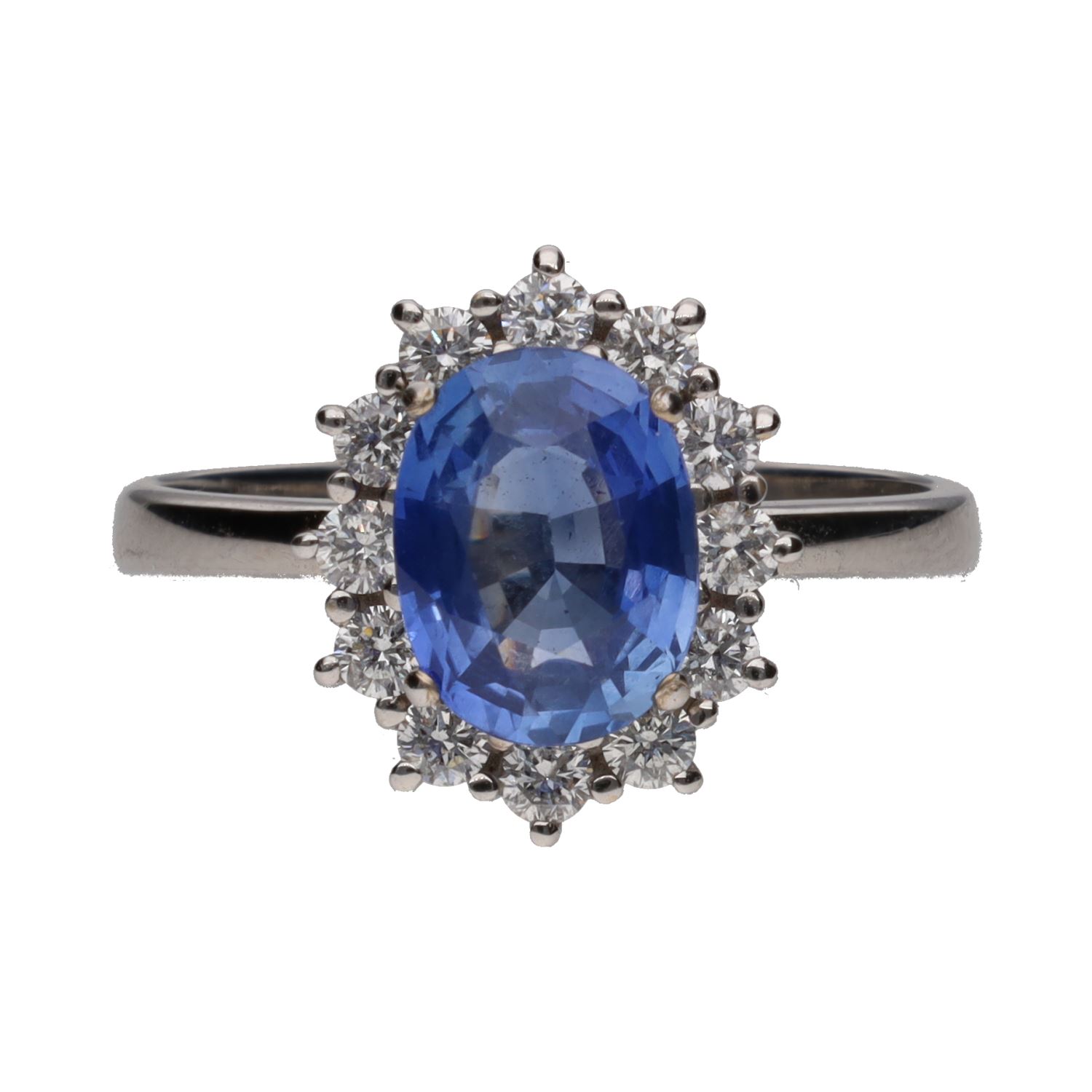 Sortija en oro blanco con zafiro y orla de brillantes. Talla 14.