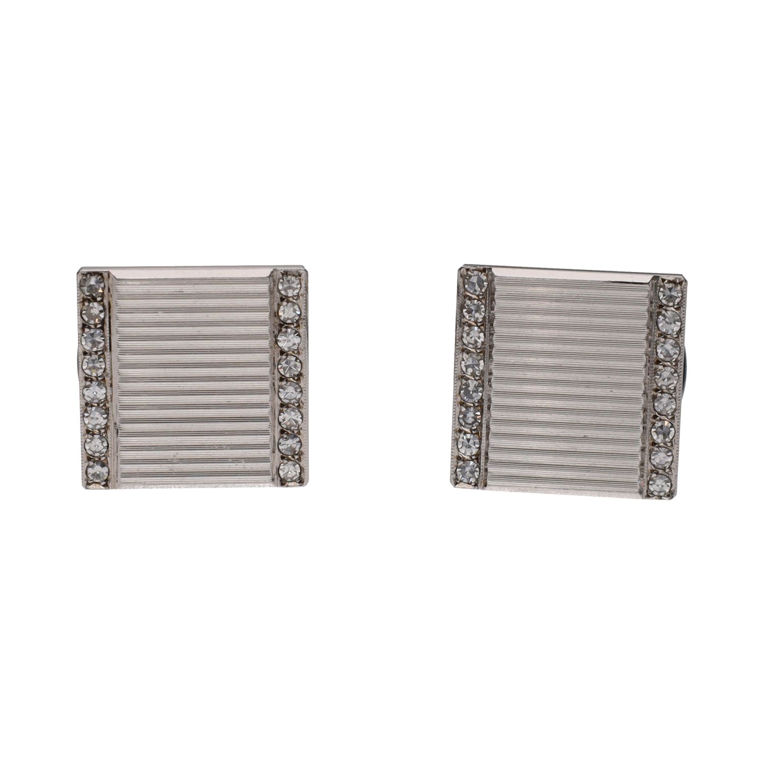 Gemelos cuadrados en oro blanco con brillantes.