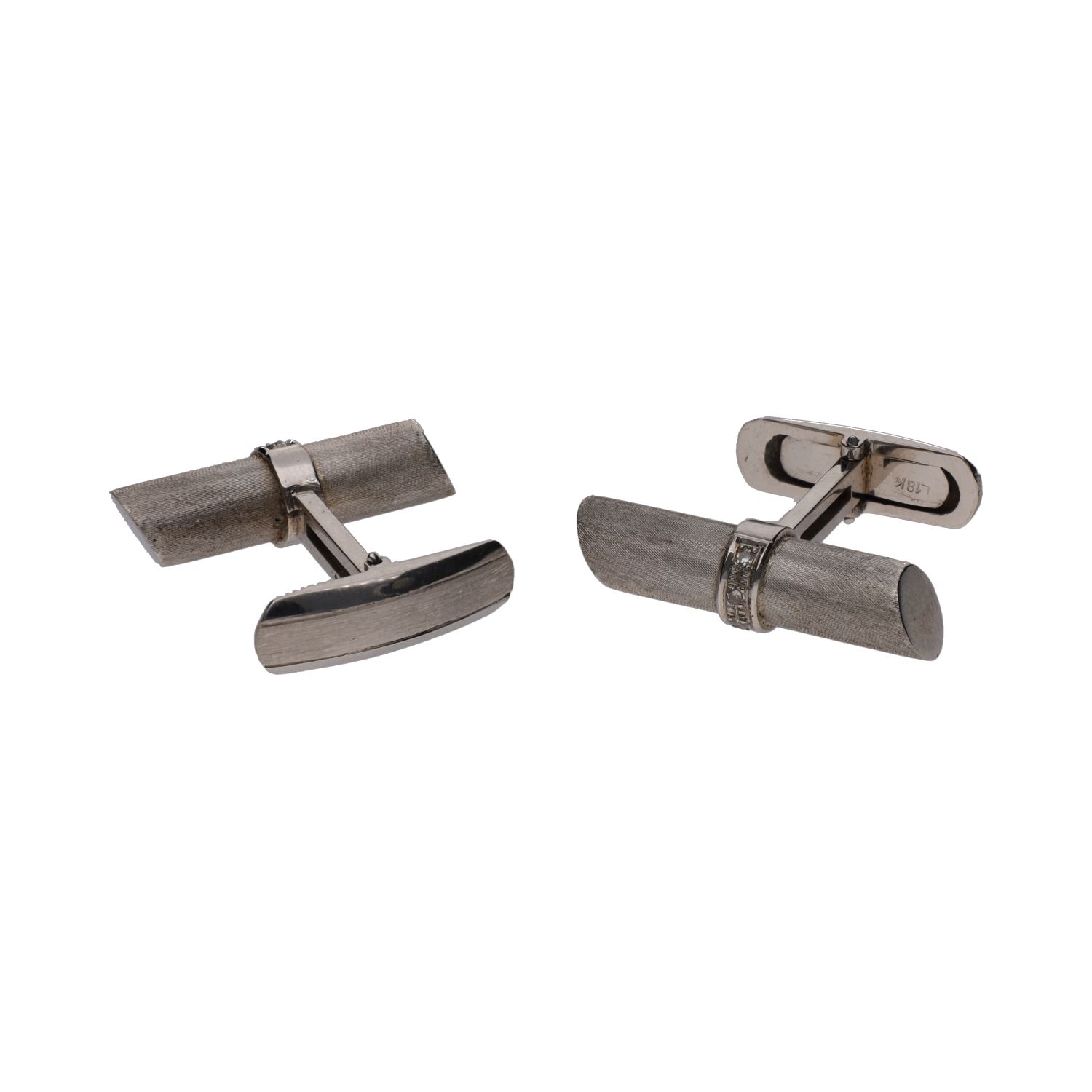 Gemelos en oro blanco con brillantes.