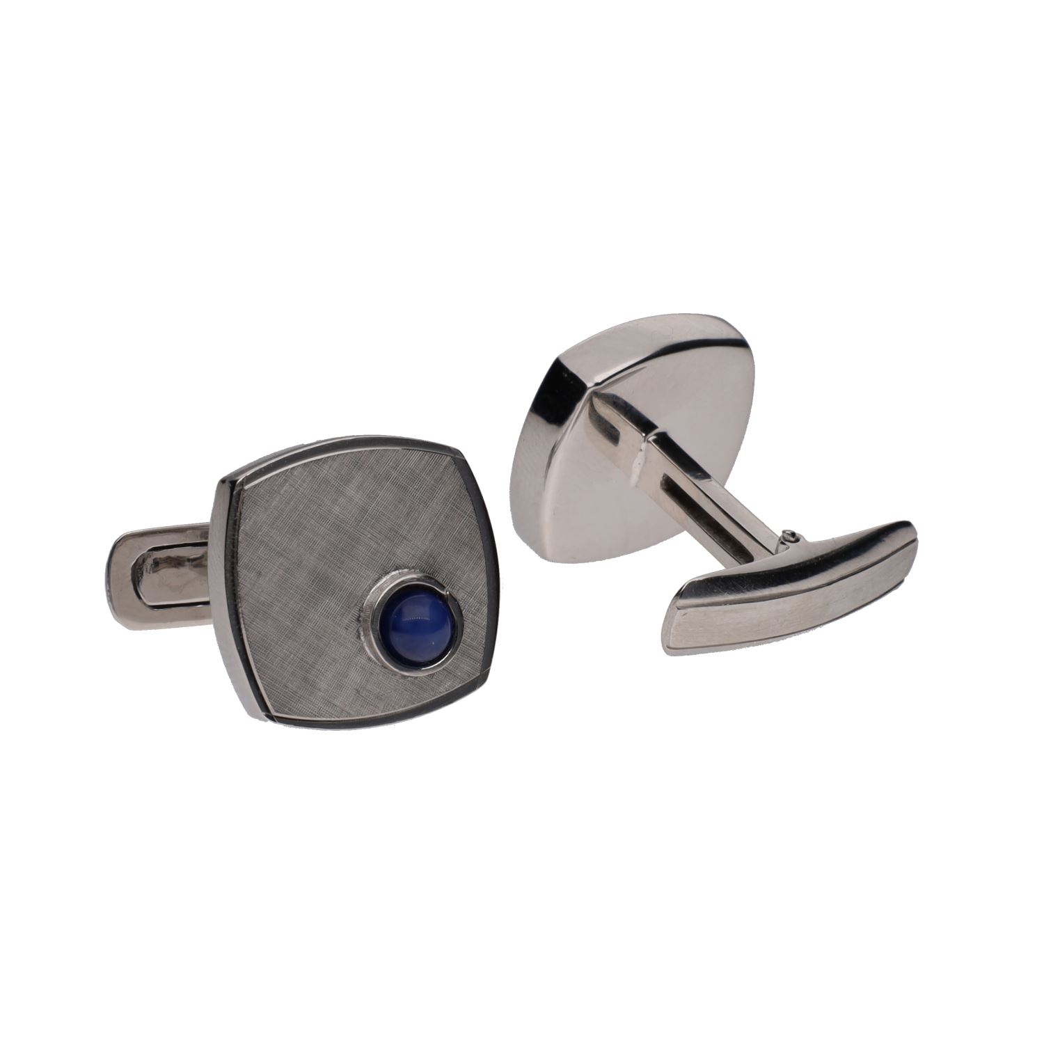 Gemelos en oro blanco con zafiros estrella.
