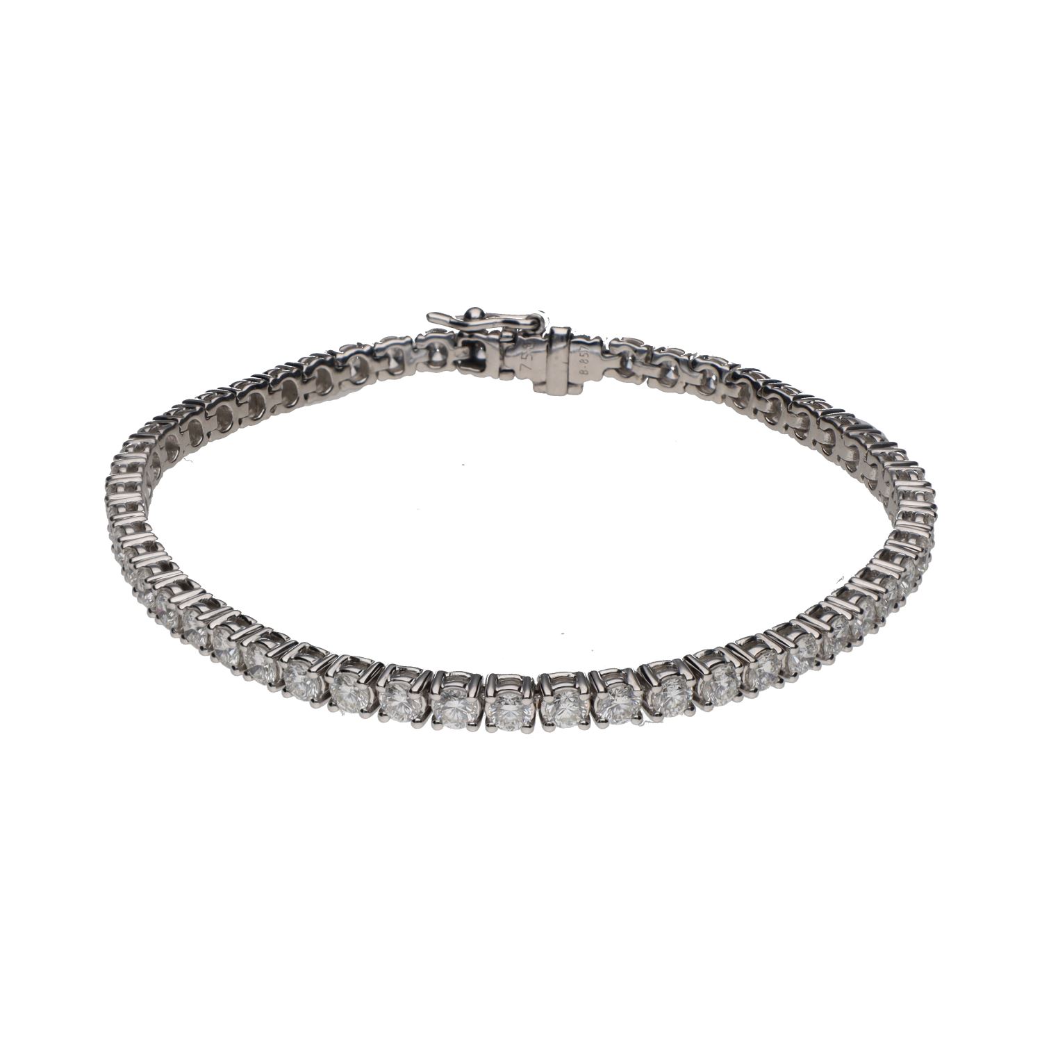 Pulsera riviere en oro blanco con brillantes.