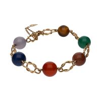 Pulsera en oro amarillo con bolas de piedras de colores.