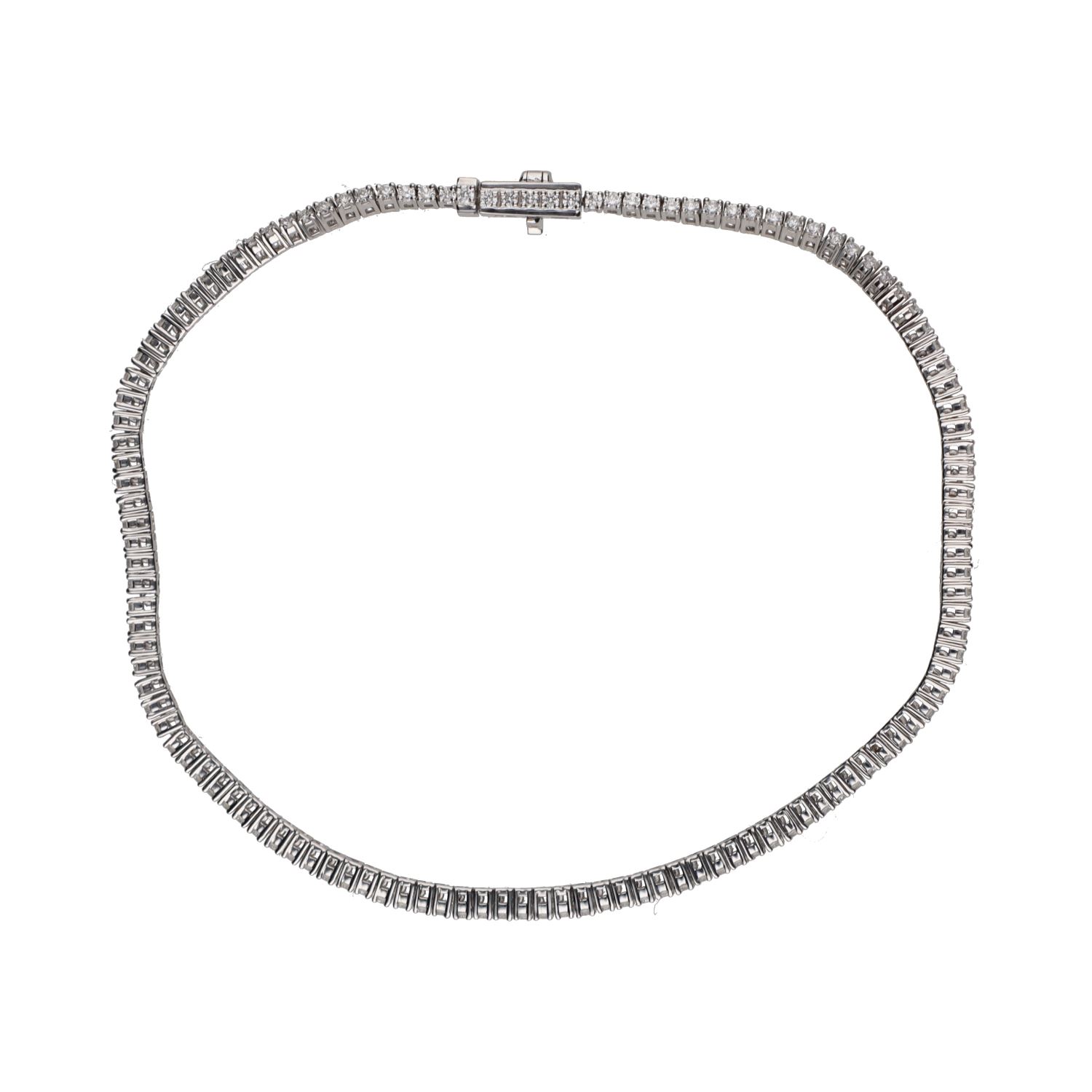 Pulsera riviere en oro blanco con brillantes.