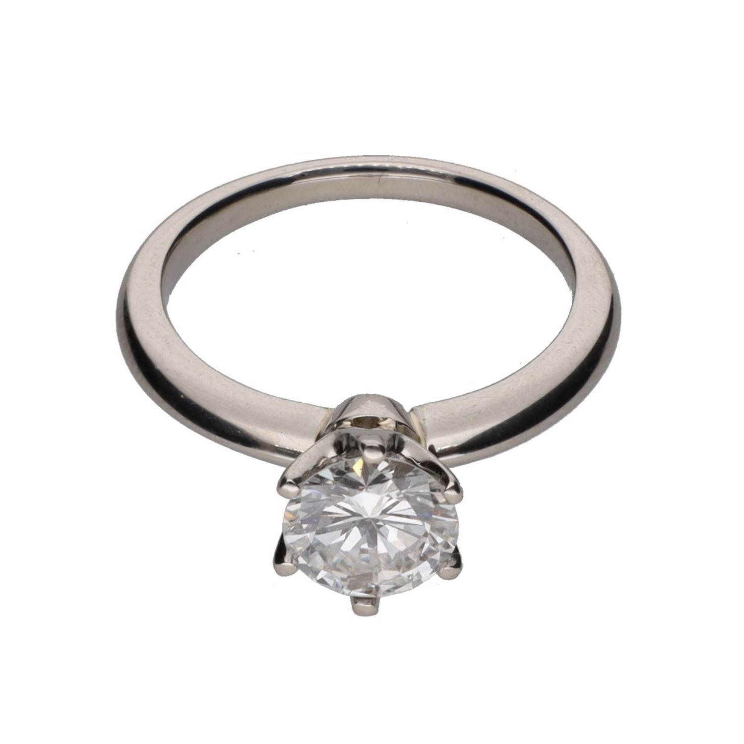 Sortija solitario en oro blanco con un brillante. Talla 12.