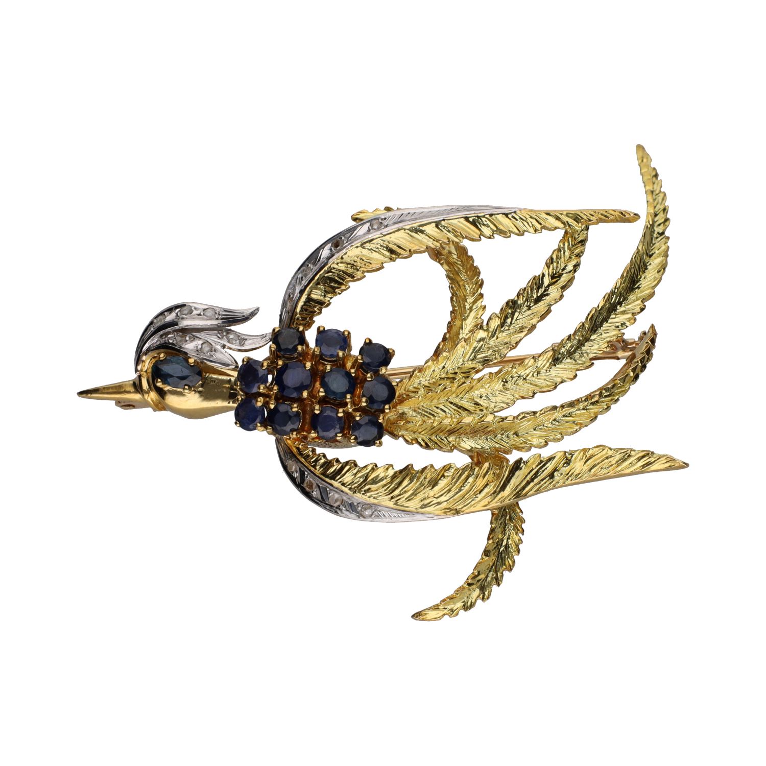 Broche con forma de fénix en oro amarillo con zafiros y diamantes.