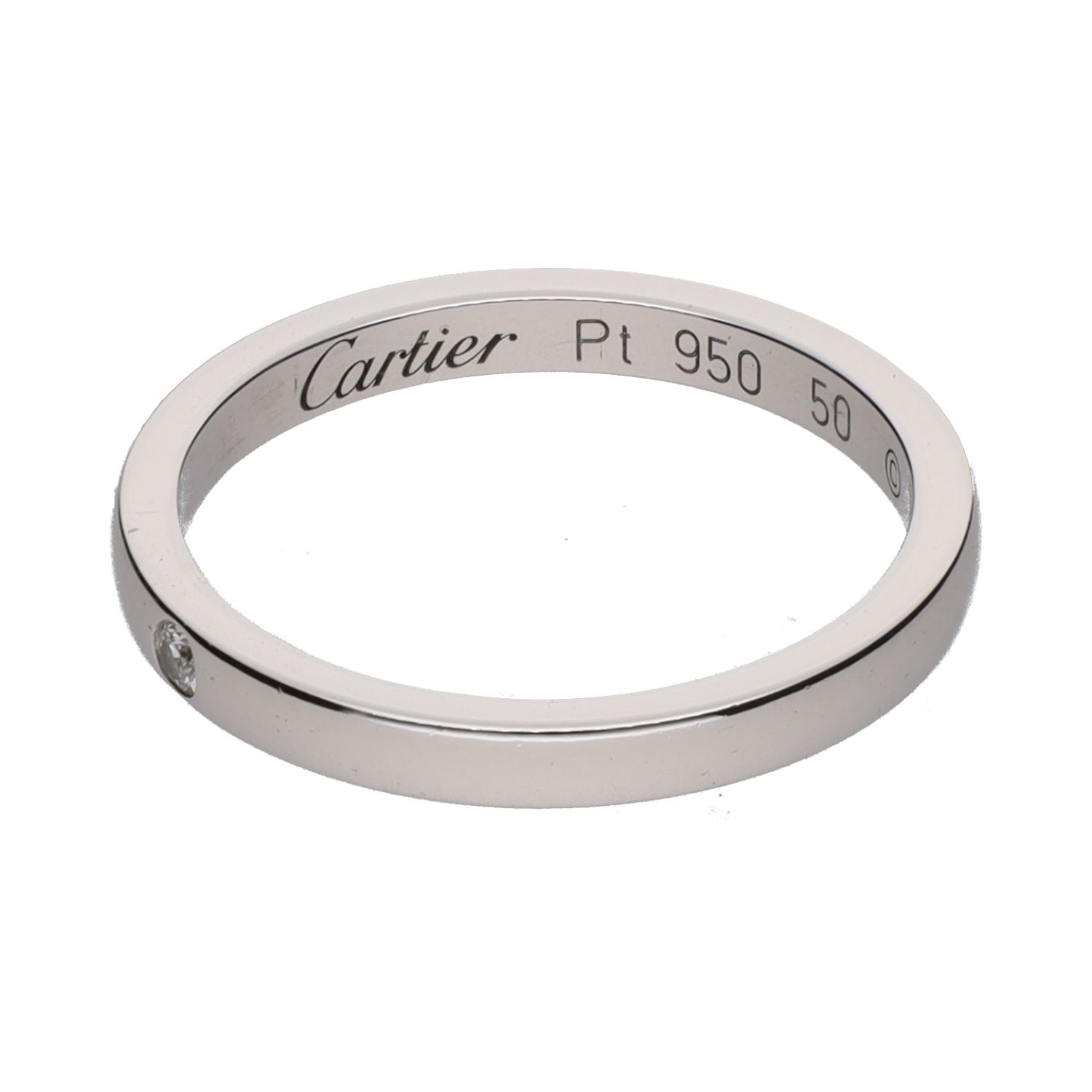 Sortija alianza de cartier con un brillante en platino. Talla 50.