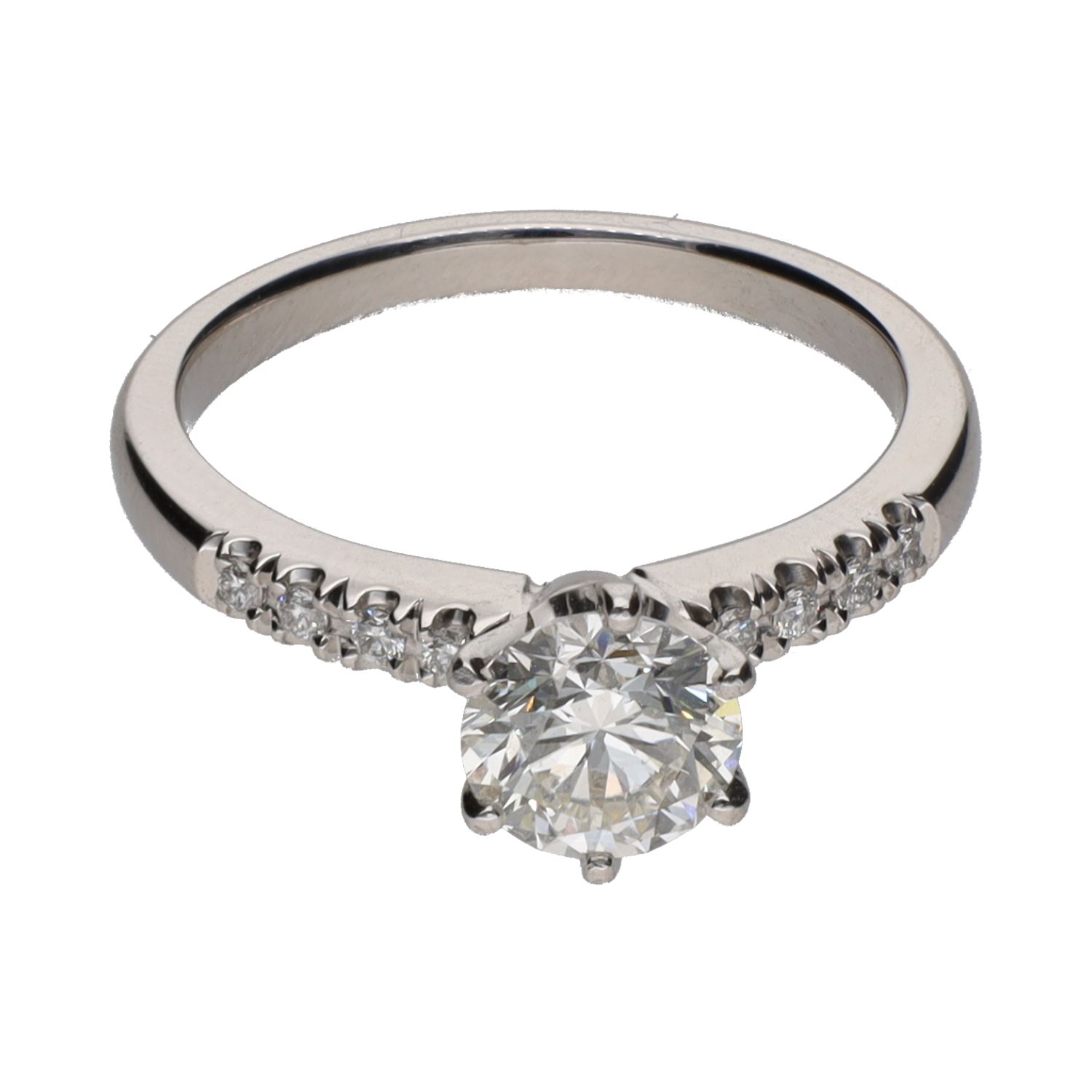 Sortija solitario en oro blanco con brillantes. Talla 13.