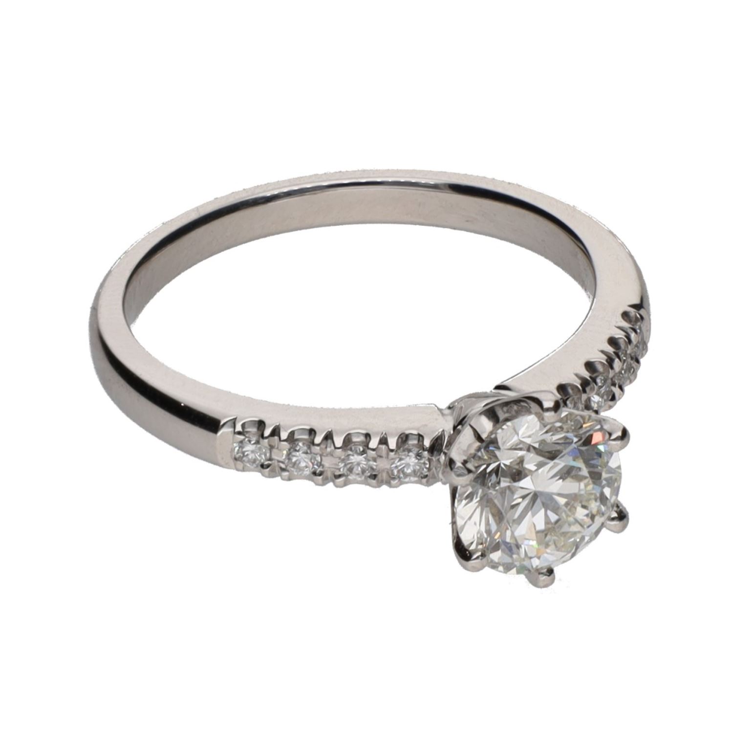 Sortija solitario en oro blanco con brillantes. Talla 13.