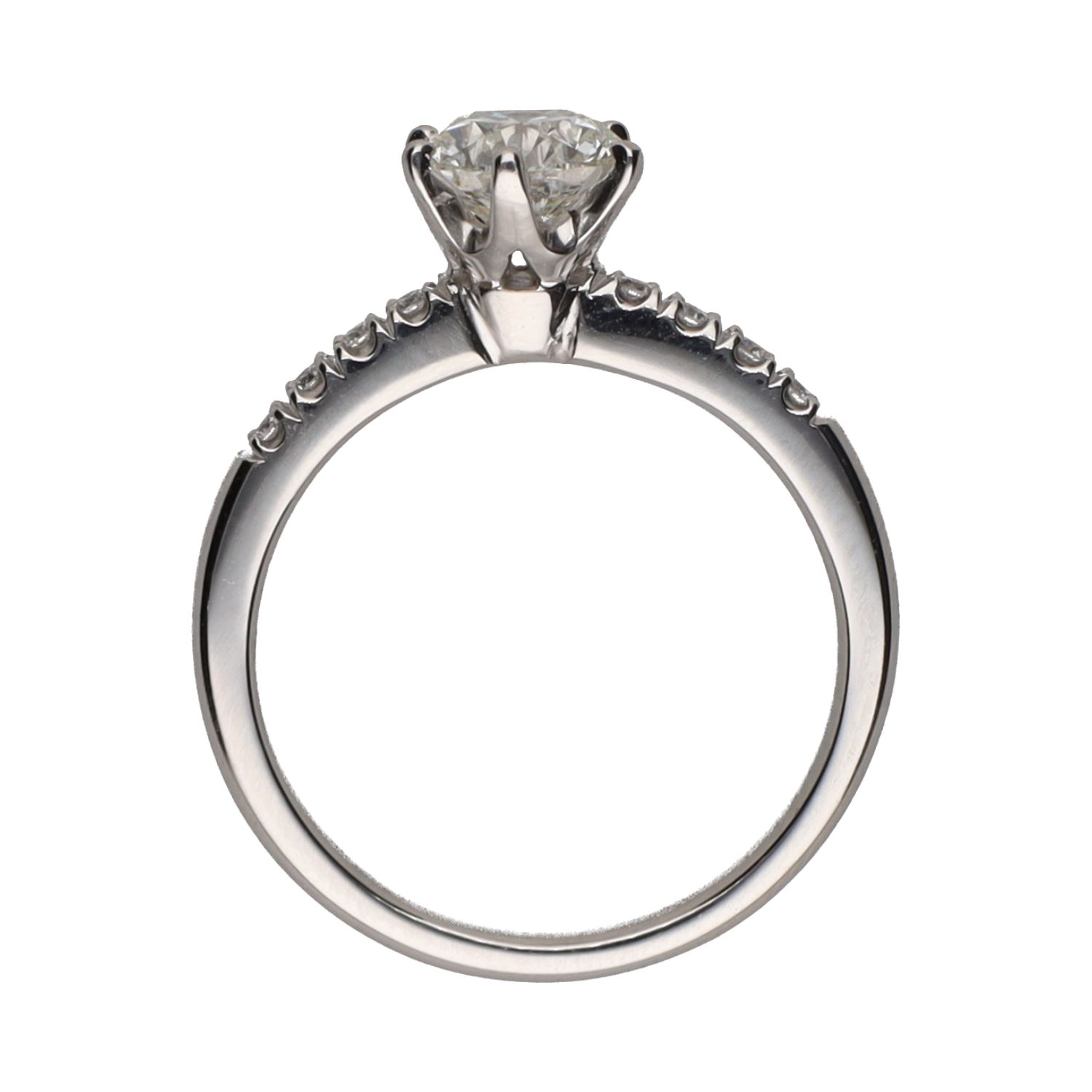 Sortija solitario en oro blanco con brillantes. Talla 13.