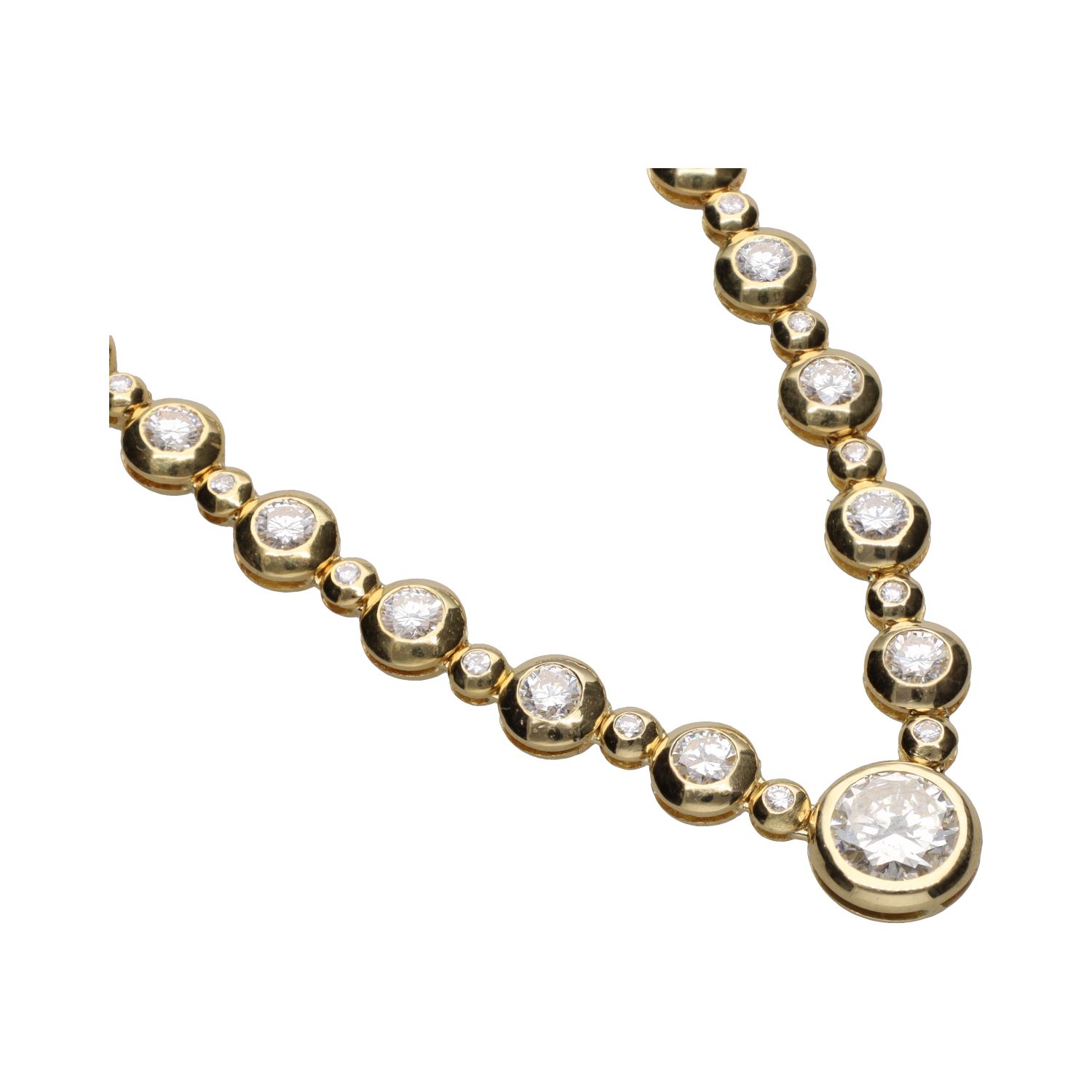 Collar en oro amarillo con brillantes en chatón.