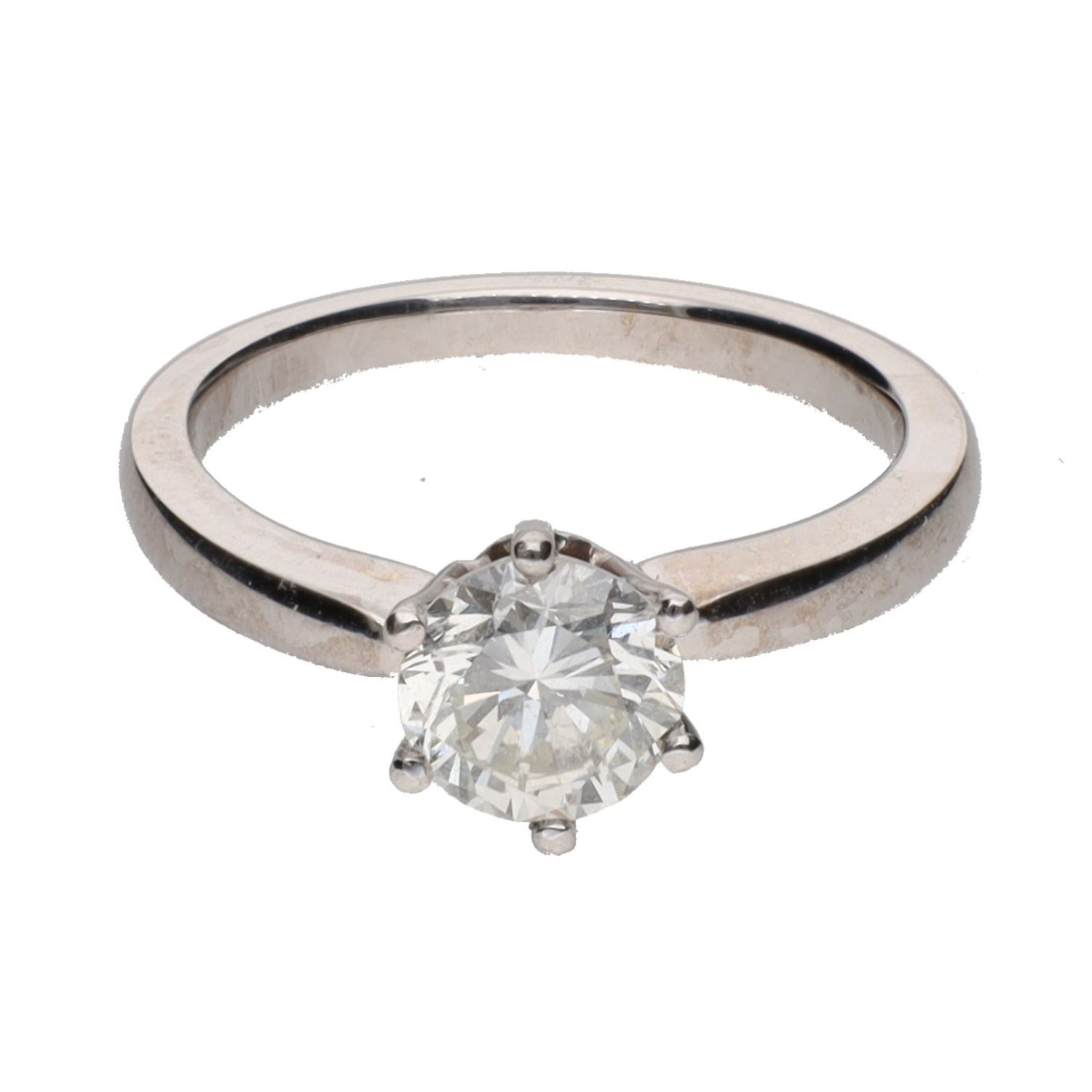 Sortija solitario en oro blanco con un brillante.   Talla 13.