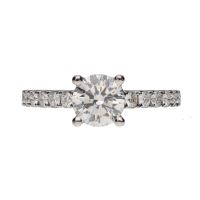 Sortija solitario en oro blanco con brillantes.   Talla 13.