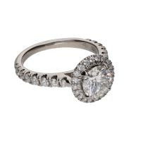 Sortija solitario de cartier en platino con brillantes. Talla 48.