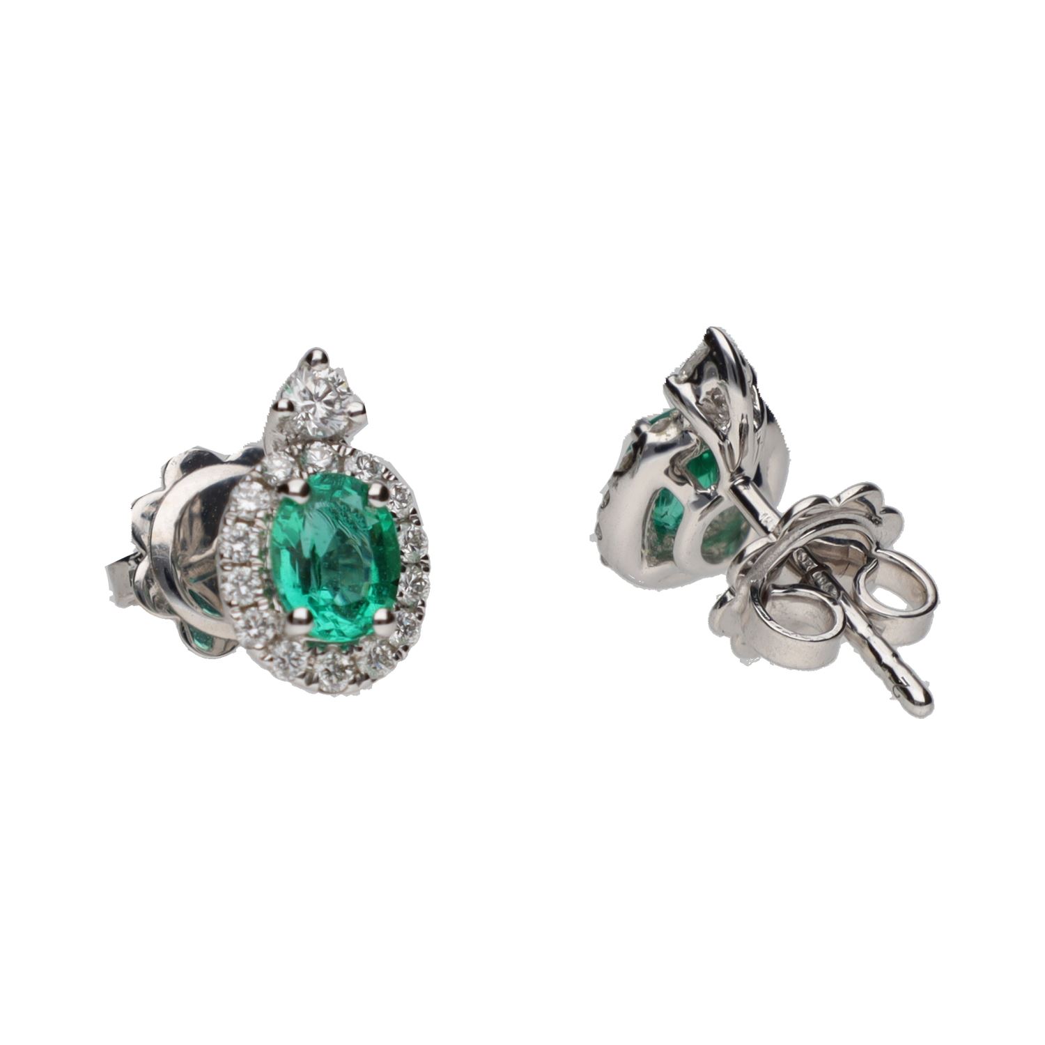 Pendientes en oro blanco con esmeraldas y brillantes.