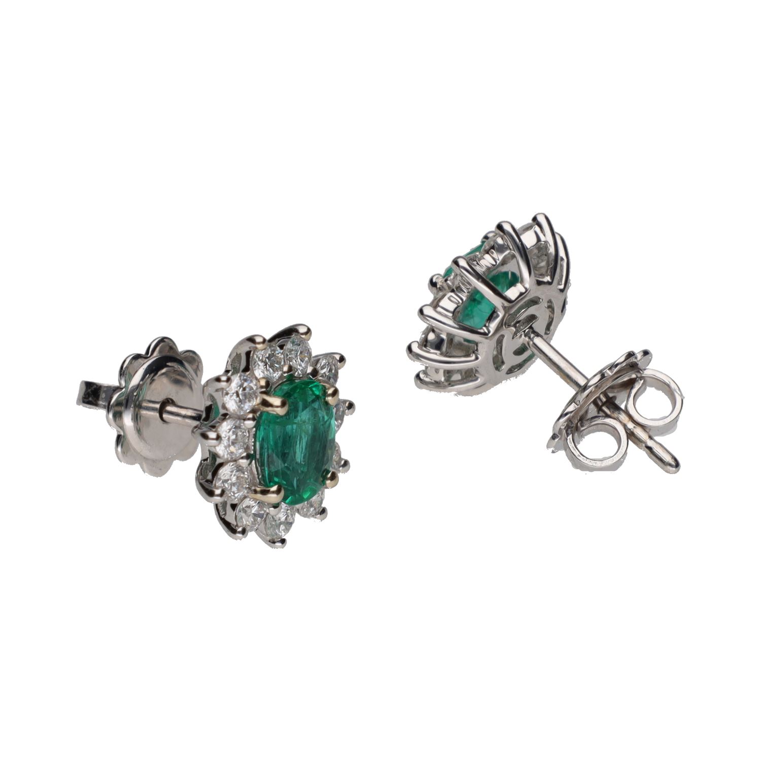 Pendientes en oro blanco con esmeraldas y brillantes.