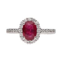 Sortija en oro blanco con rubí y brillantes. Talla 14.