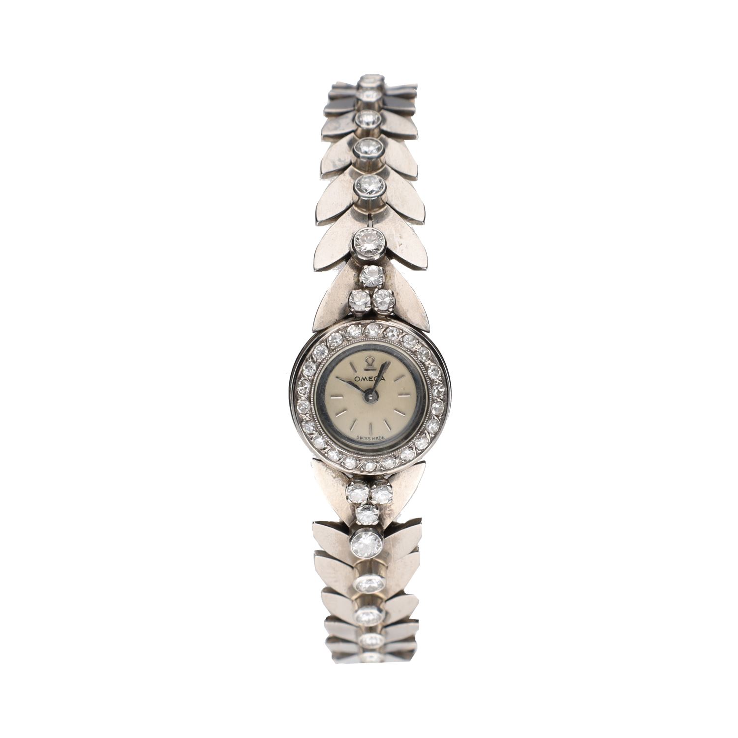 Reloj pulsera antiguo en oro blanco con brillantes.  