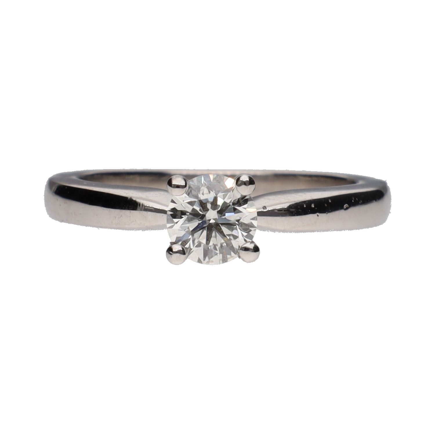 Sortija solitario en oro blanco con brillante. Talla 12.