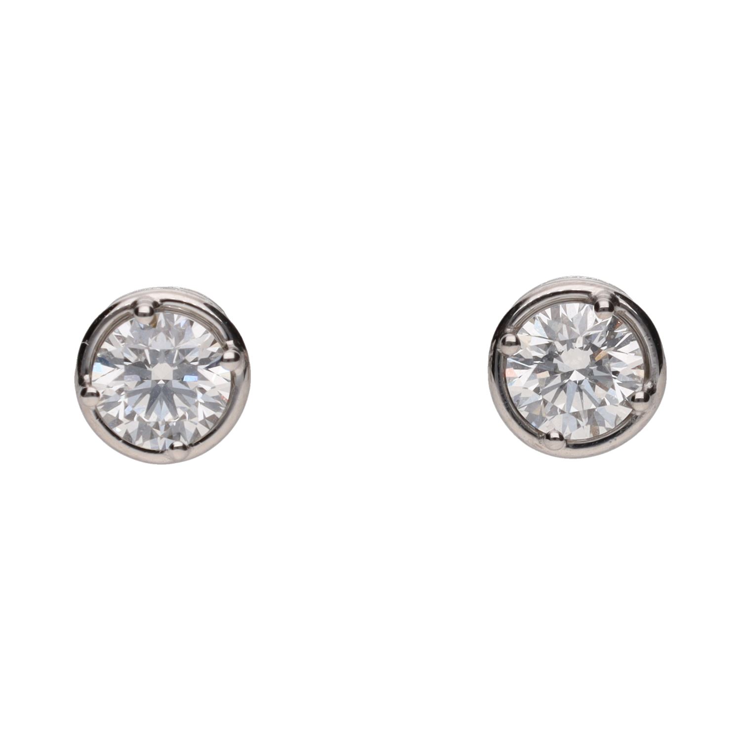 Pendientes dormilonas en oro blanco con brillantes.