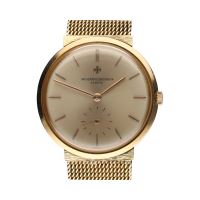 Clasico cuerda manual oro amarillo 32mm.   