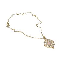 Collar realizado en oro amarillo con cuarzo rosa y brillantes.