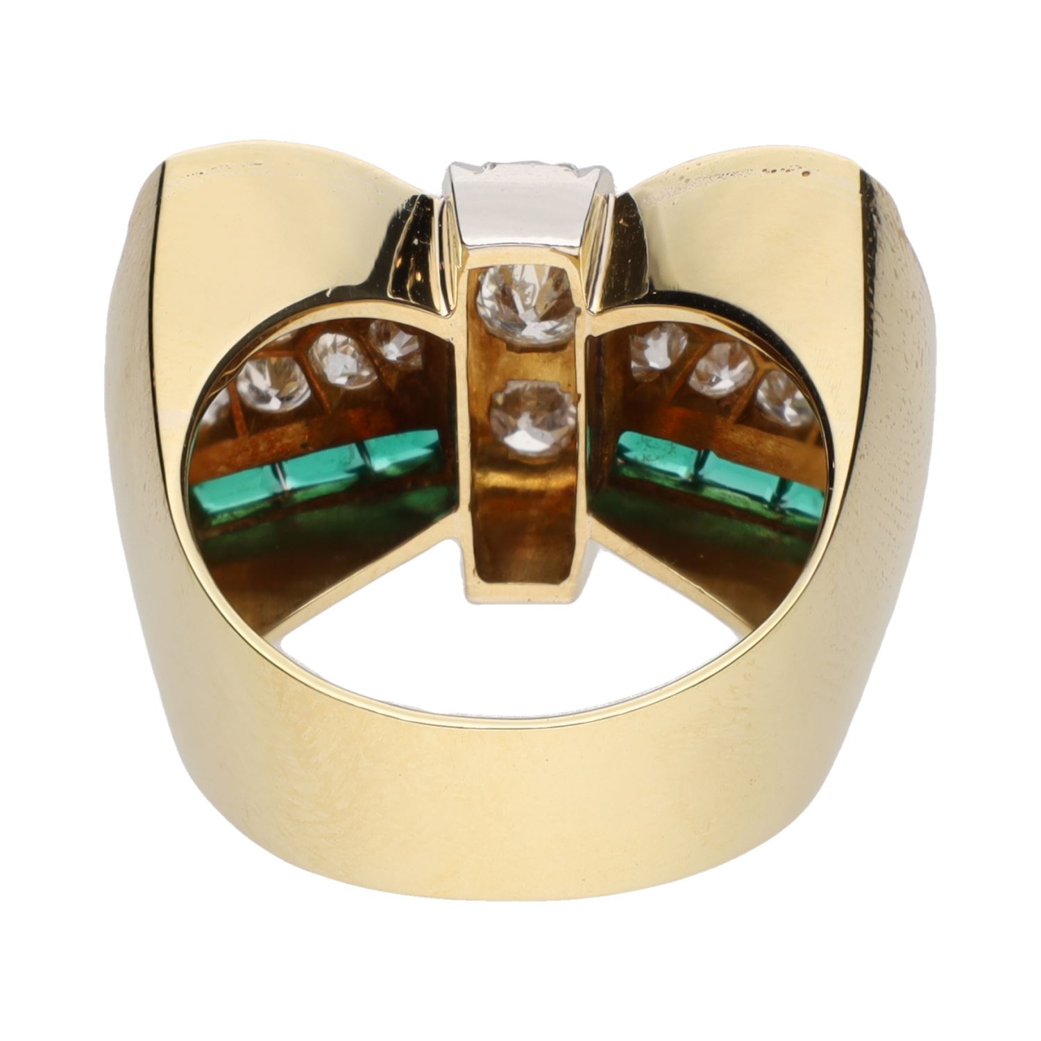 Sortija art-deco forma de lazo en oro amarillo con esmeraldas y brillantes. Talla 15.