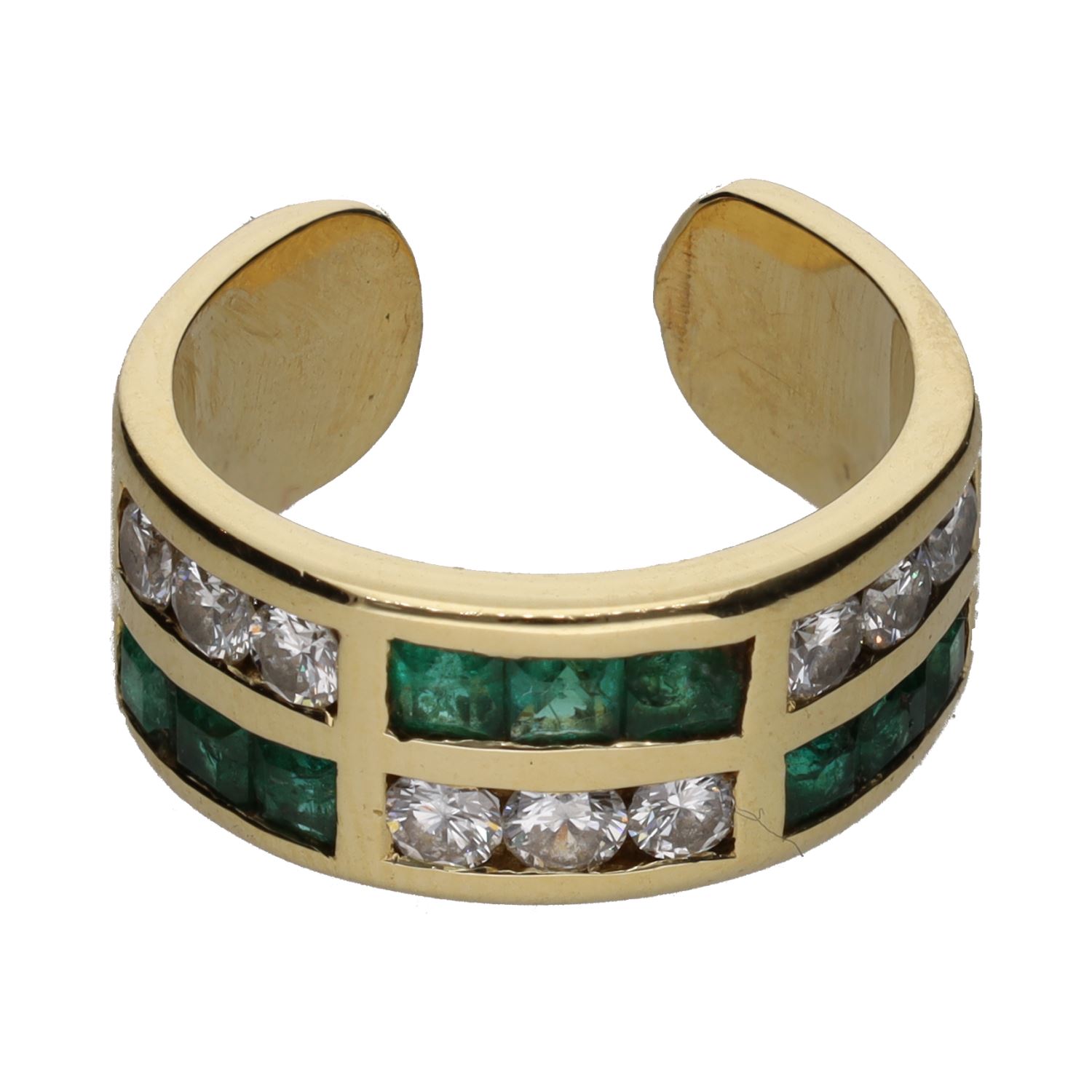 Sortija abierta realizada en oro amarillo con esmeraldas y brillantes. Talla 12.