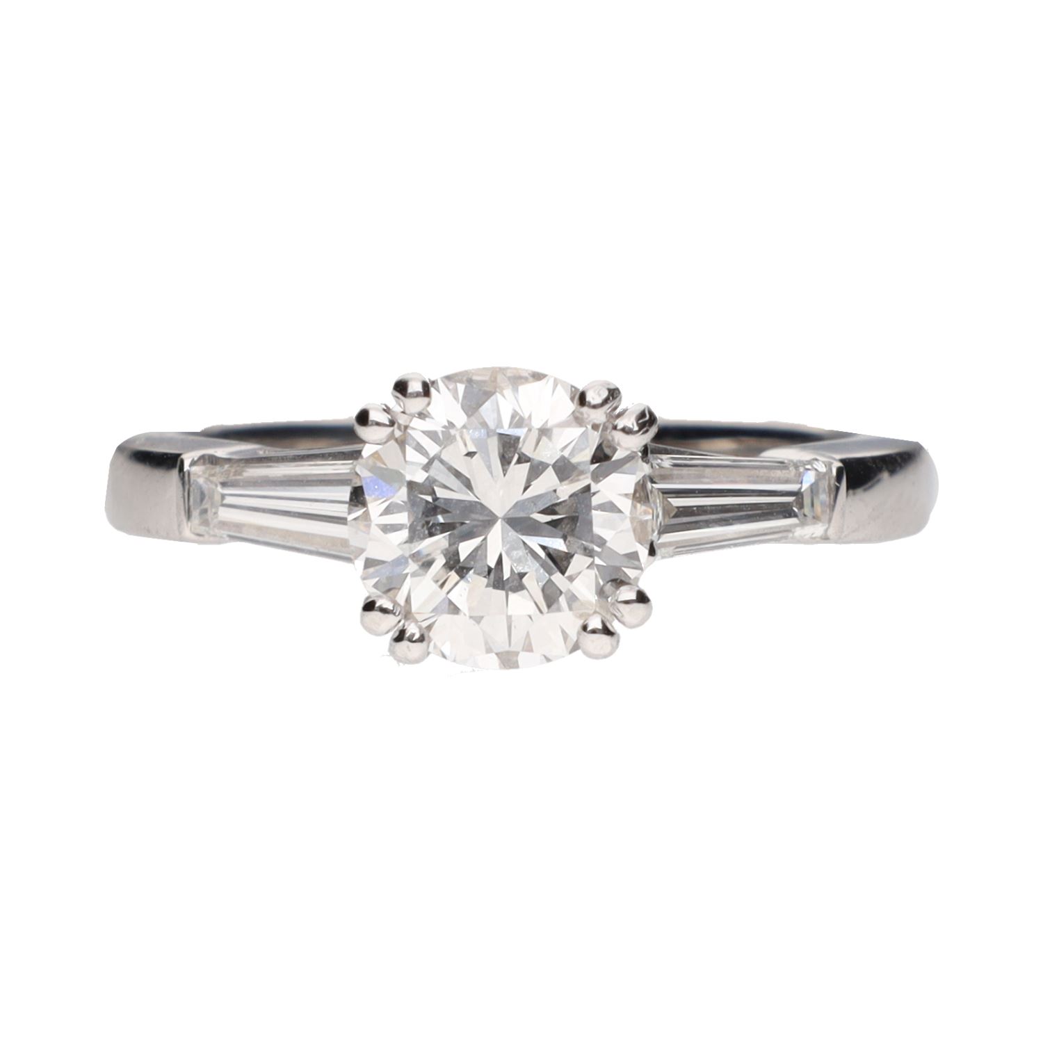 Solitario en oro blanco con brillante central 1,46ct y baguettes. Talla 13.