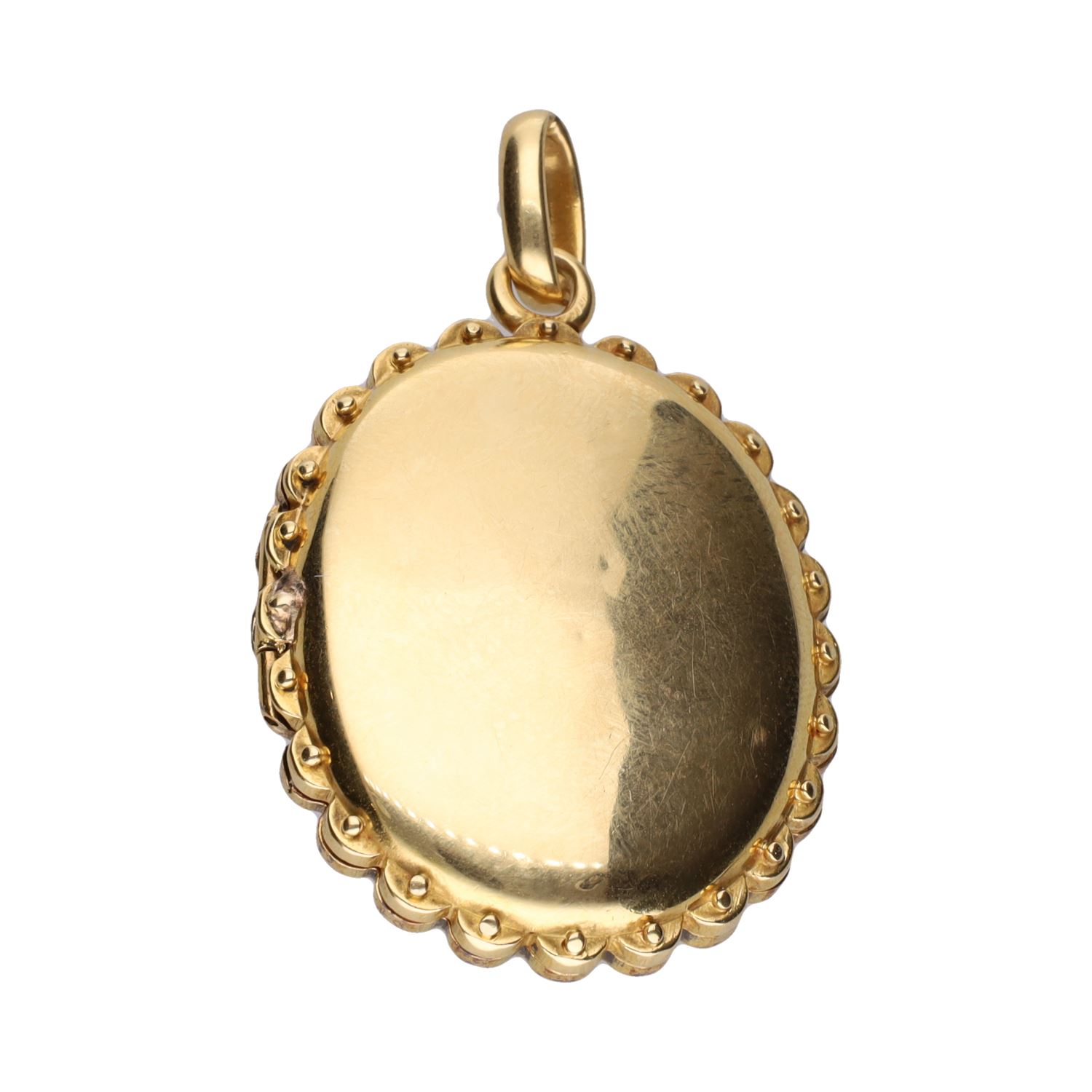 Colgante guardapelos o portarretrato en oro amarillo, turquesas y diamantes.