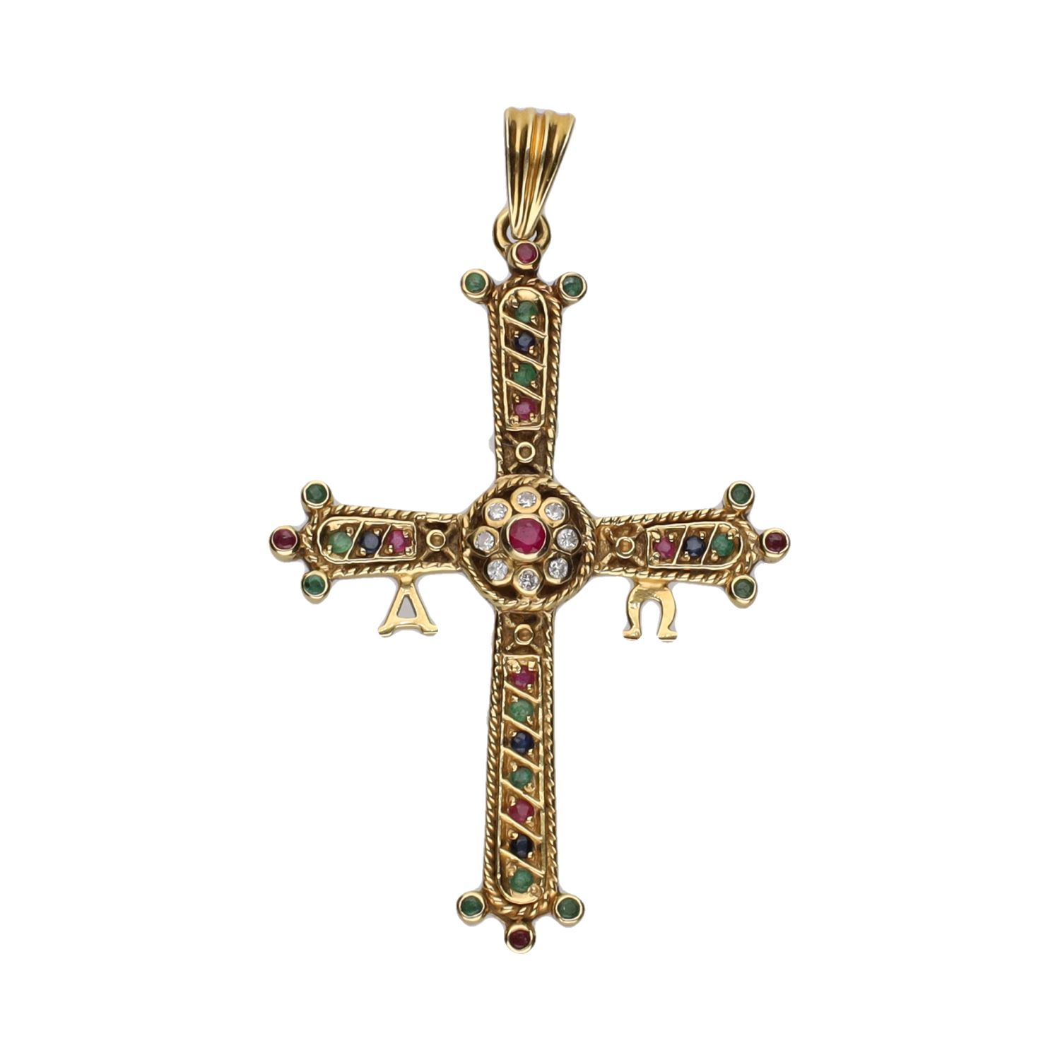Colgante cruz en oro amarillo con rubíes, esmeraldas, zafiros y diamantes.
