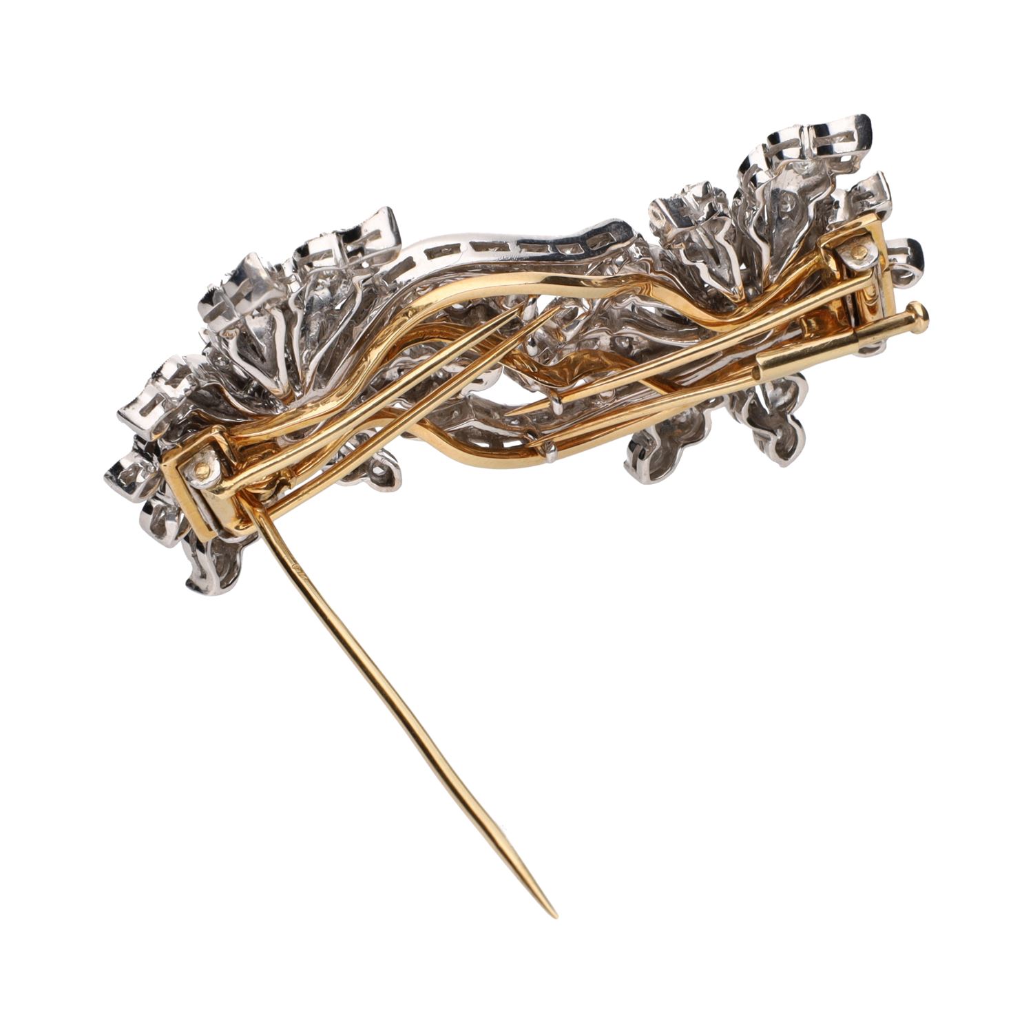 Broche doble clip en oro amarillo y oro blanco con diamantes.