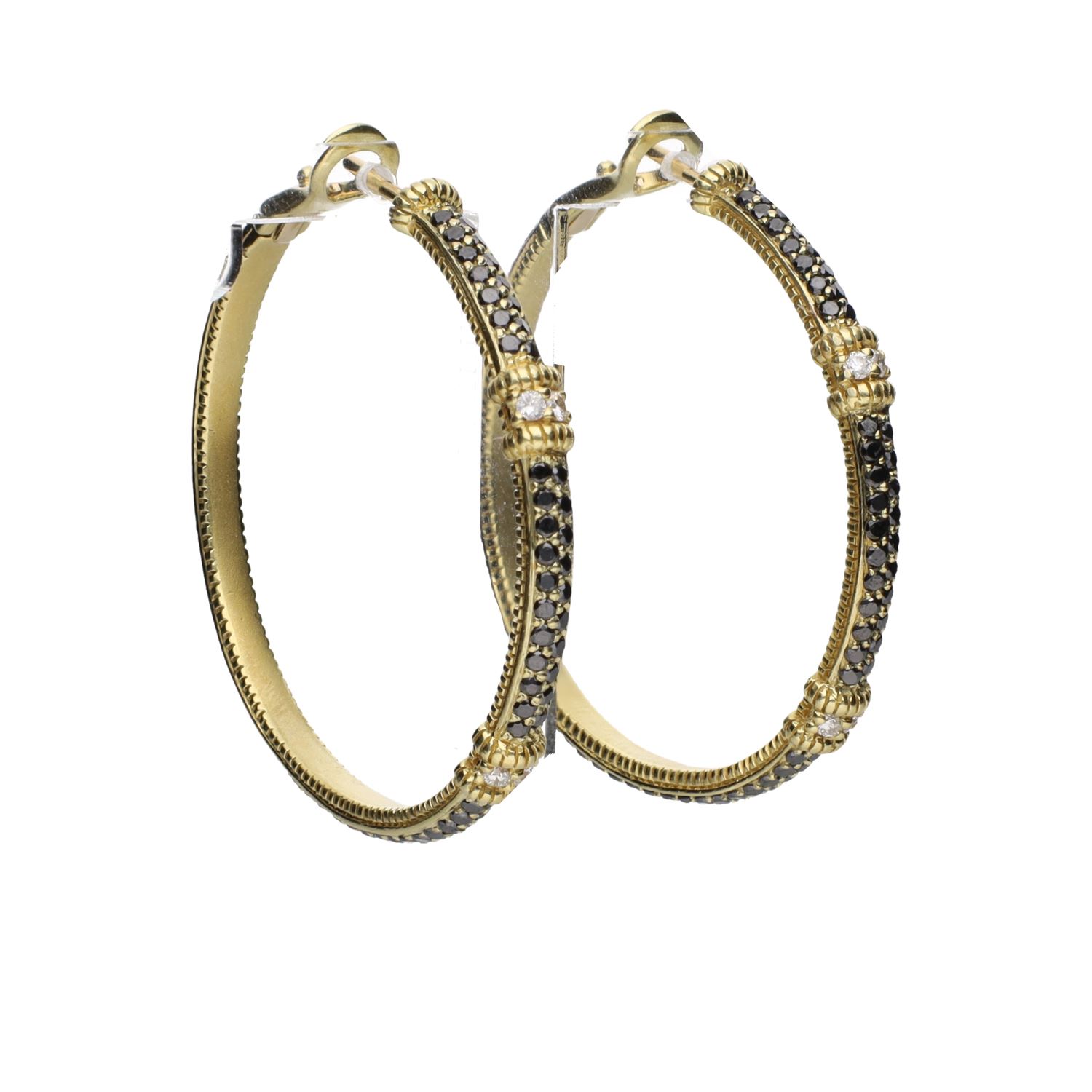 Pendientes argolla en oro amarillo con zafiros y brillantes.