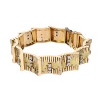 Pulsera en oro amarillo con brillantes.