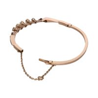 Pulsera antigua rígida en oro amarillo con diamantes.