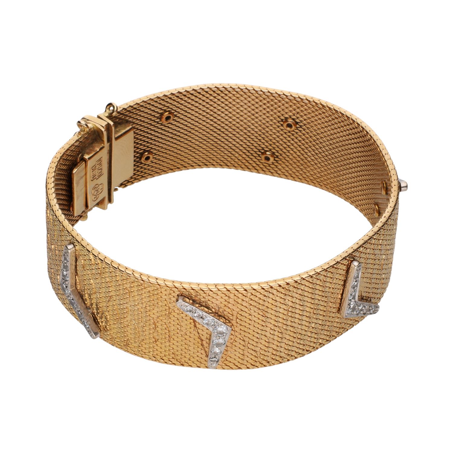 Pulsera en oro amarillo con brillantes.