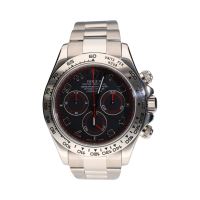 Daytona oro blanco esfera gris detalles rojos.   