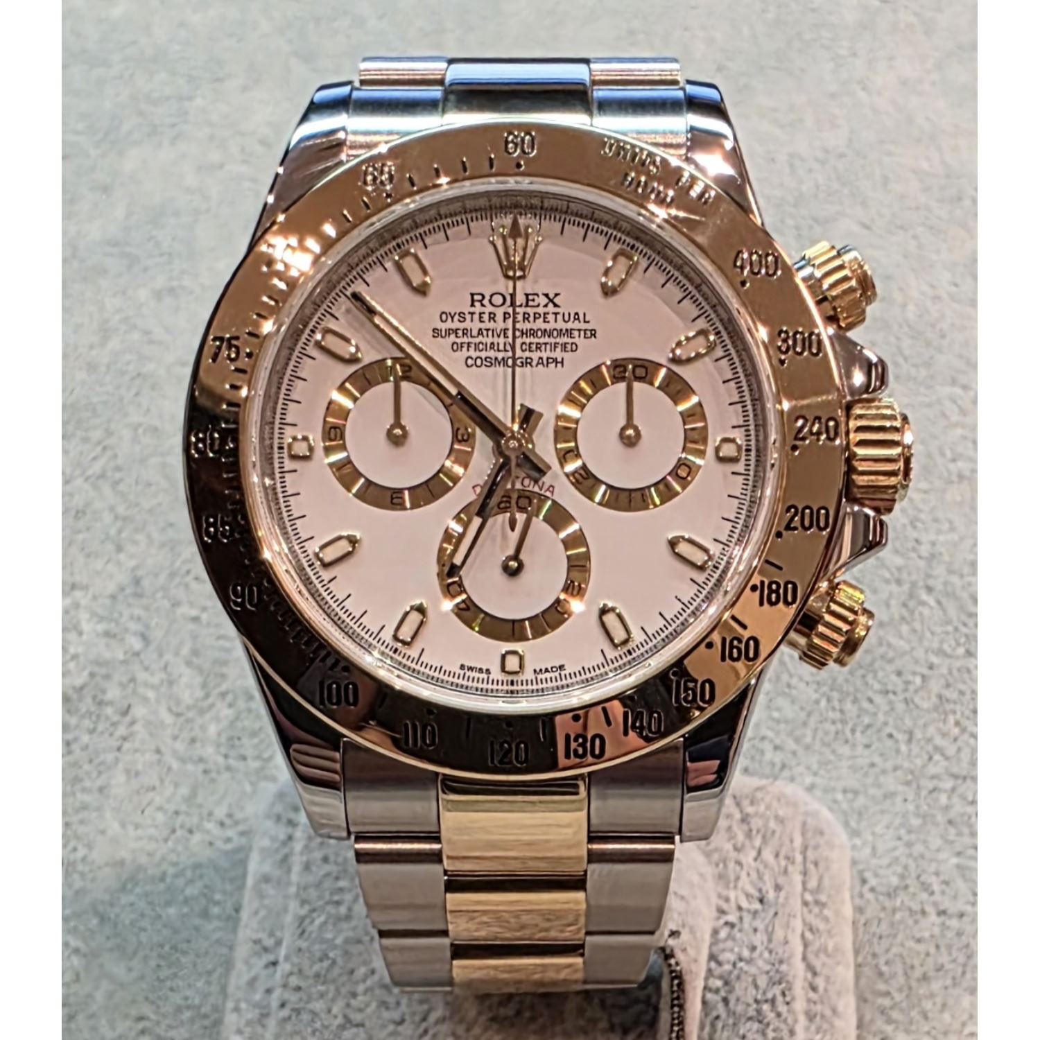 Daytona acero y oro esfera blanca.   