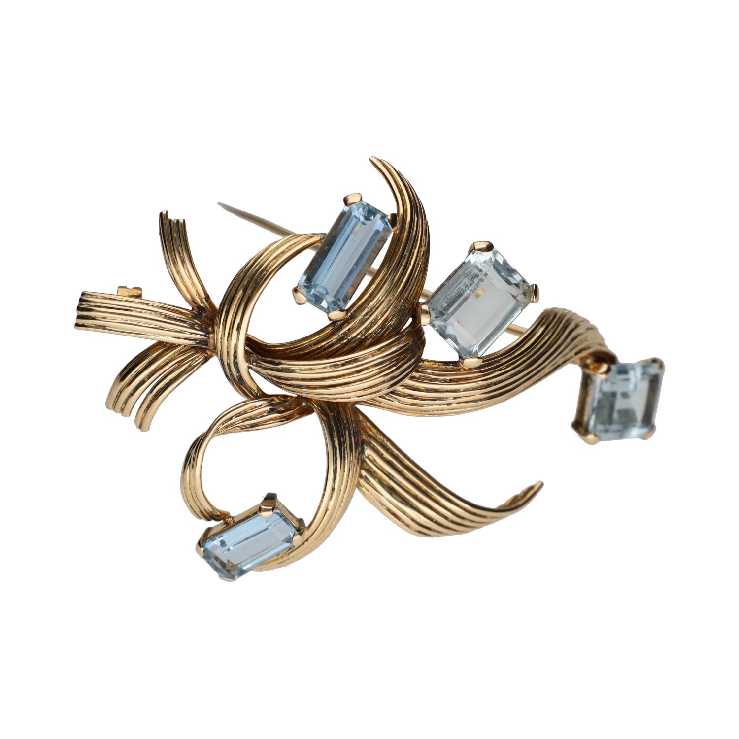 Broche en oro amarillo con agua marinas.