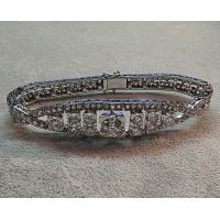 Pulsera antigua en oro blanco con diamantes.