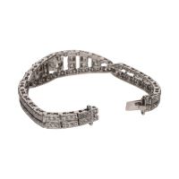 Pulsera antigua en oro blanco con diamantes.